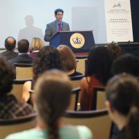 Man speaking from podium